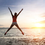 bigstock-Sporty-Woman-Jumping-On-Sunset-94924724